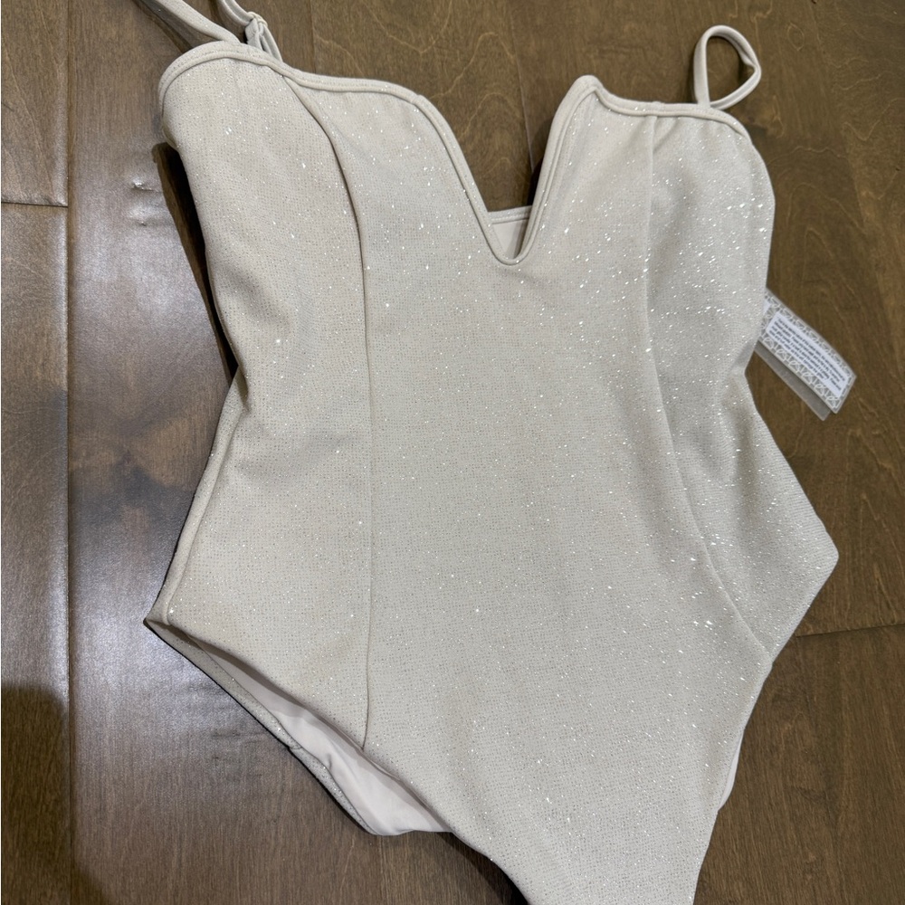 Devon Windsor sparkly champagne bathing suit